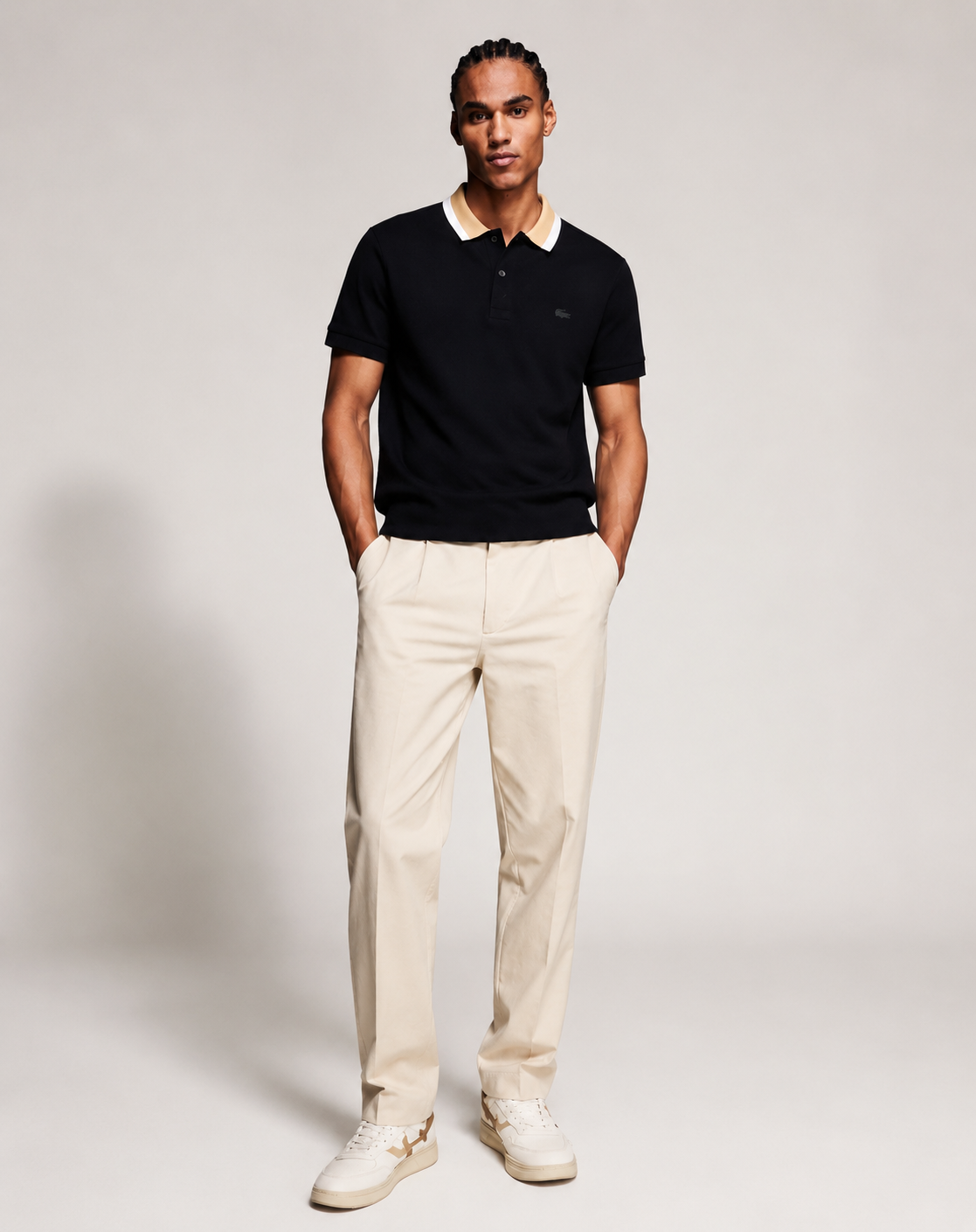 Lacoste Men's Regular Fit Piqué Polo featuring a contrasting beige and white collar
