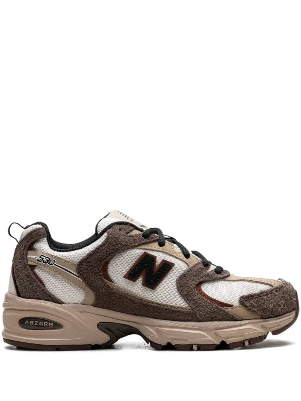 New Balance 530 trainers in white and brown