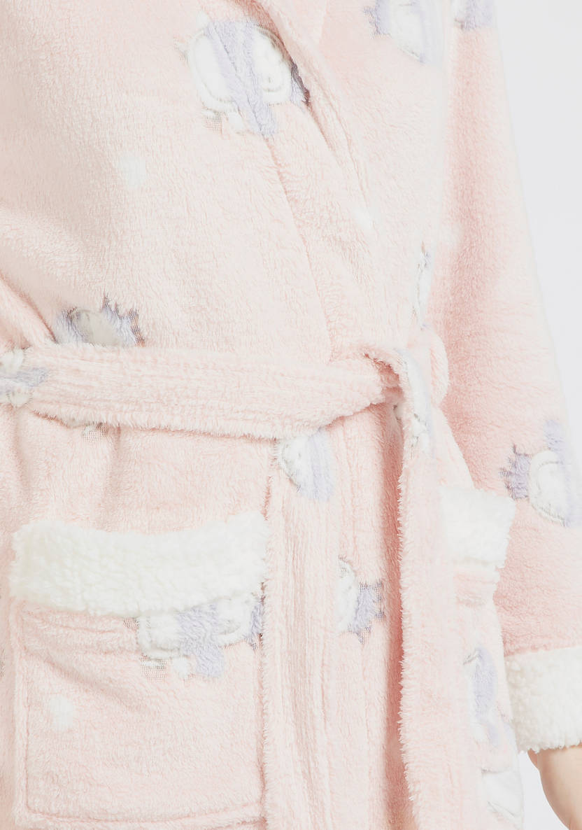 Textured robe with a hood, long sleeves, and pockets