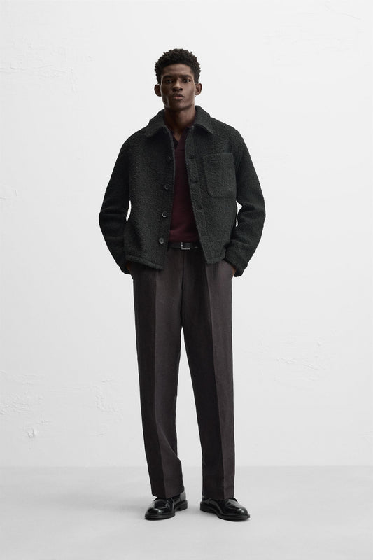 Zara bouclé jacket with patch pockets.