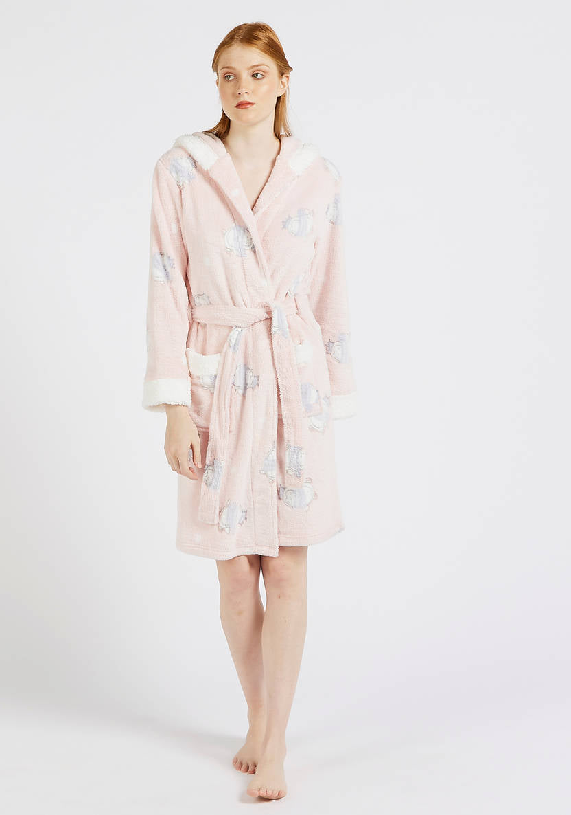 Textured robe with a hood, long sleeves, and pockets