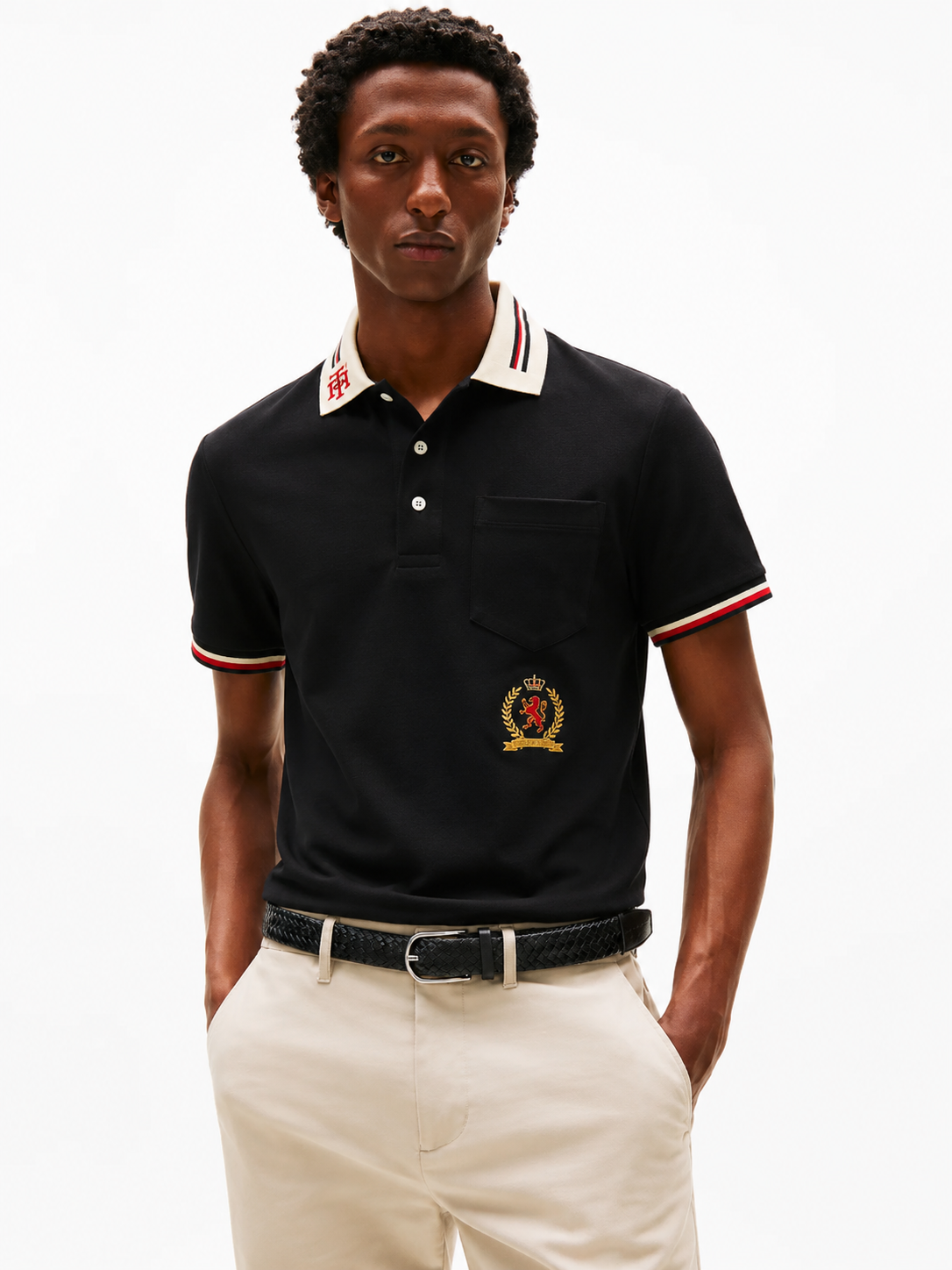 Tommy Hilfiger polo shirt features a contrast collar with signature stripe Midnight navy regular fit