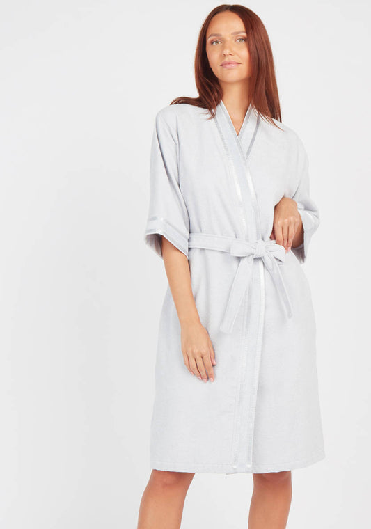 Textured swimsuit with 3/4 sleeves and tie details