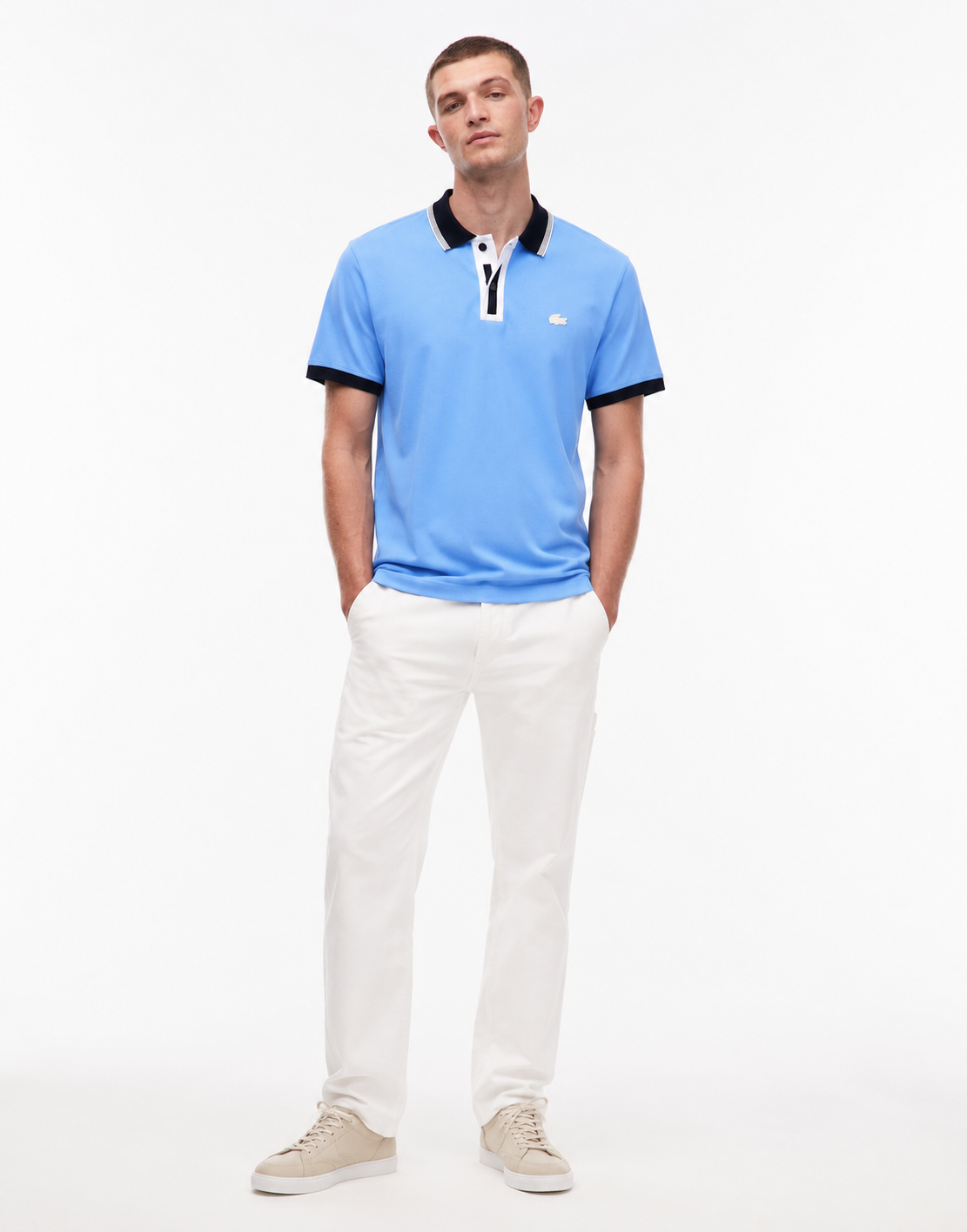 Lacoste Men's Regular Fit Contrasting Accents Piqué Polo features a light blue cotton