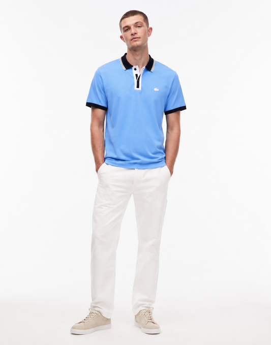 Lacoste Men's Regular Fit Contrasting Accents Piqué Polo features a light blue cotton
