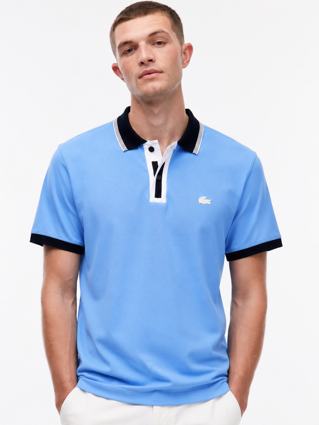 Lacoste Men's Regular Fit Contrasting Accents Piqué Polo features a light blue cotton